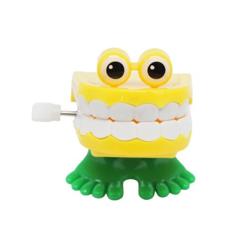 Заводная игрушка "Зубы", желтые (MiC)