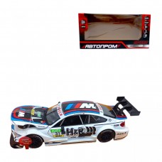 Машина мет. 1:24 BMW M4, бат., світло ,звук ,відк. двері та капот.