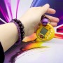 Електронна гра-брелок “Тамагочі: Pet Egg Game” (жовта) (MiC)