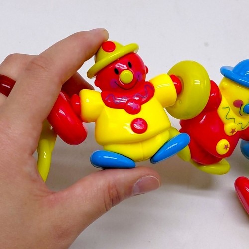 Брязкальце на візок "Клоуни" в кульку р.46x10x3 см (YG Toys)